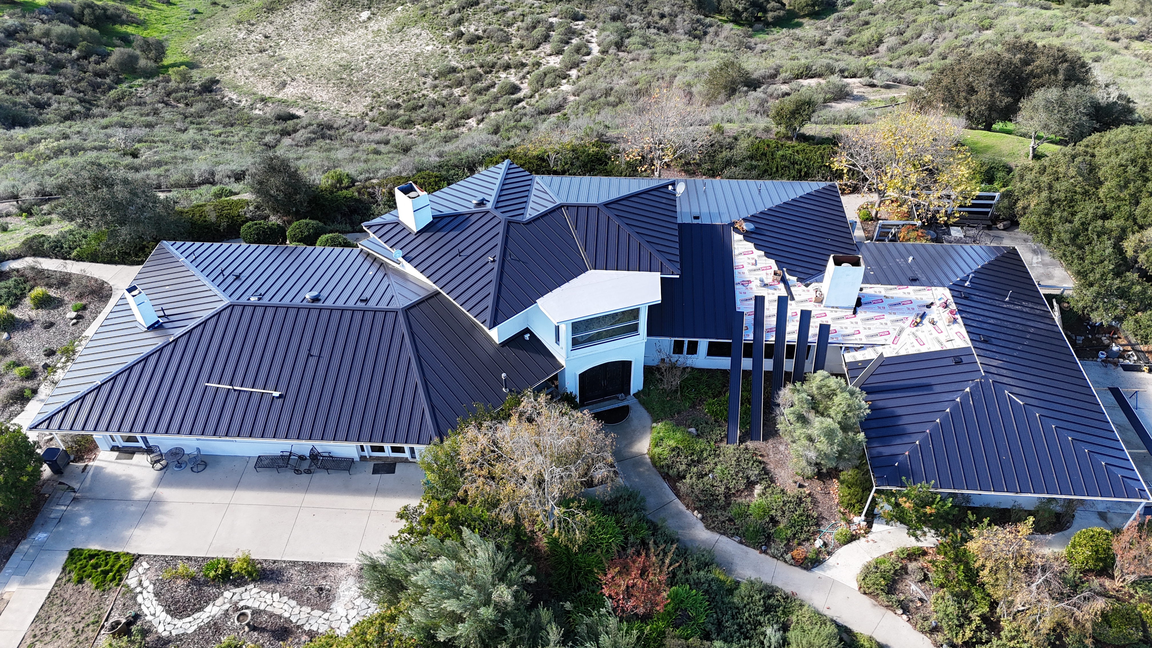 Aerial view of completed roofing project